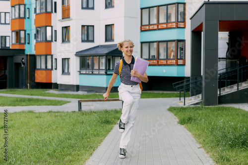 A happy student runs to school, hurries to classes, rejoices in the new academic year. Back to school