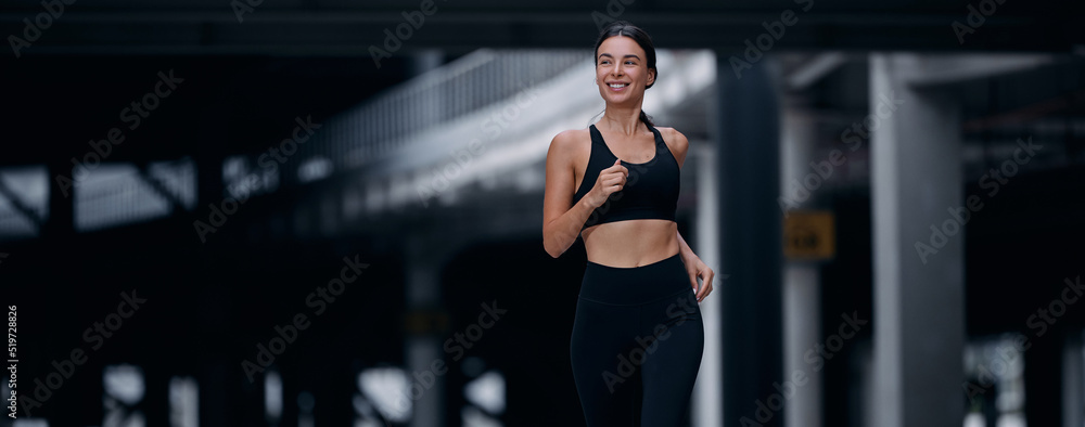 Strong woman running forward to success in her fitness life. Urban sport concept. Strong woman running forward to success in her fitness life. Urban sport concept.