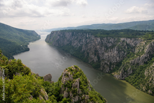 Beautiful view of The Iron gate of the Danube river, natural border between Serbia and Romania. Djerdap National Park (Djerdapska Klisura). Photo taken from Ploce viewpoint. photo