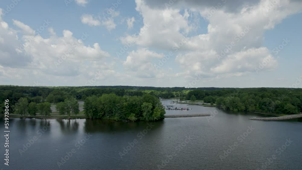 Side tracking with drone on beutiful skies over lake Side tracking with drone on beutiful skies over lake