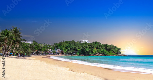 Colourful Skies Sunset over Kata Beach in Phuket Thailand. This Lovely island waters are turquoise blue waters  lush green mountains colourful skies and beautiful views of Pa Tong Patong