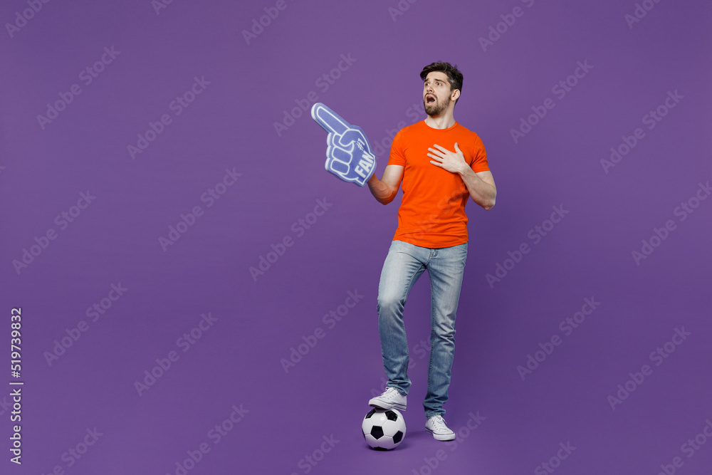 Full body young fan man he wear orange tshirt cheer up support