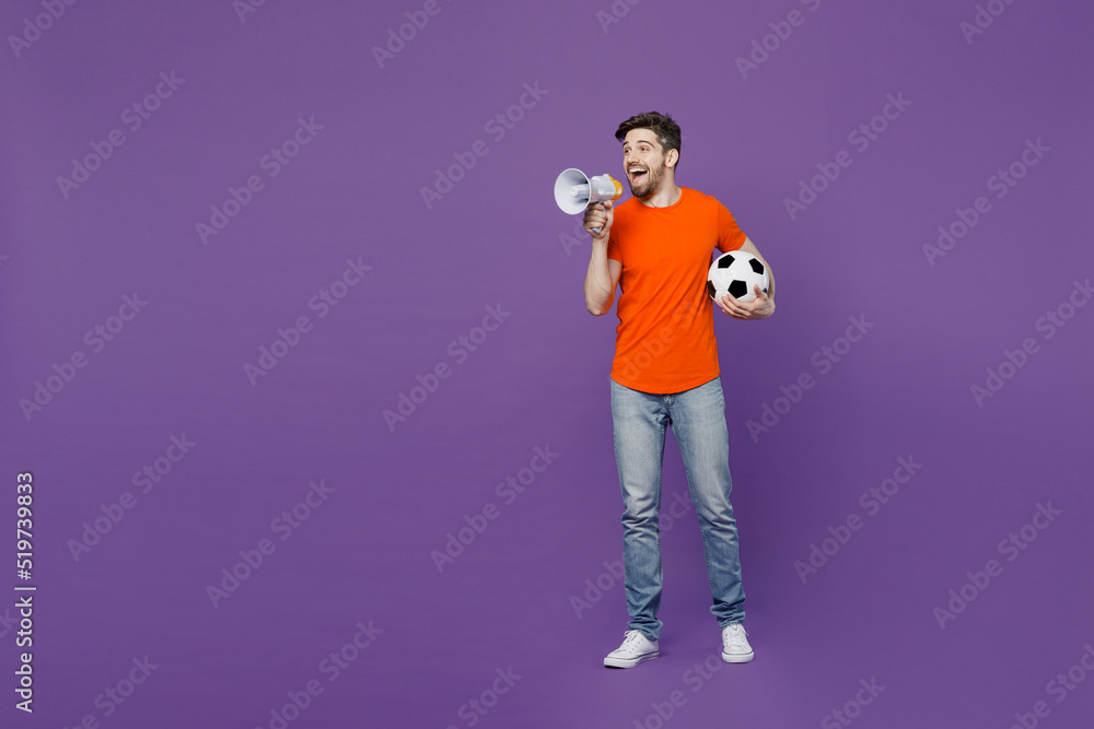 Full body young fan man he wear orange tshirt cheer up support