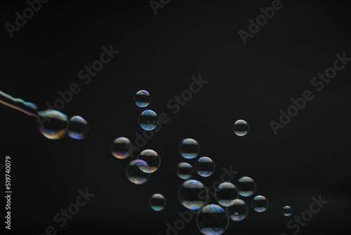 Wallpaper Mural Flying soap bubbles on black background. Abstract soap bubbles with colorful reflections. Soap bubbles in motion background. Torontodigital.ca