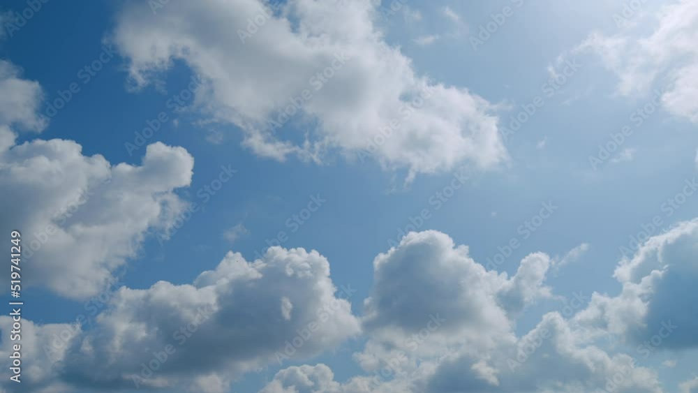 Summer blue sky and white clouds background. Layers of cloud space. Blue sky fluffy white clouds on summer season. Summer blue sky and white clouds background. Layers of cloud space. Blue sky fluffy white clouds on summer season.