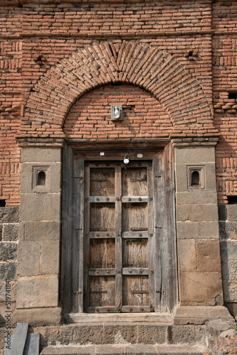 Old brickwork construction, Wooden Door, Darvaja, Beautiful Brick Pattern, Wafgaon, Taluka Khed, Dist Pune photo