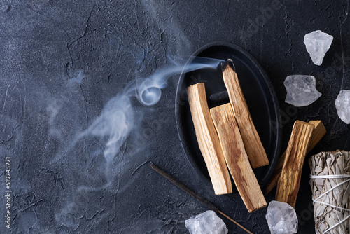 Canvas Print Palo Santo stick burning with aroma smoke, white sage, crystals for meditation esoteric ceremony