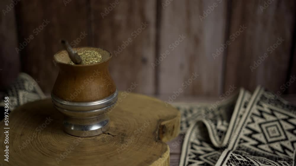Close up of mate rotating on a piece of trunk. Top view Close up of mate rotating on a piece of trunk. Top view