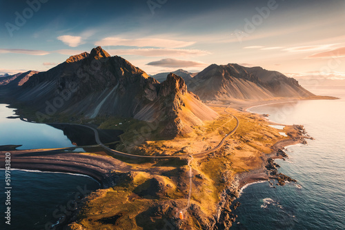 Spectacular Mount Eystrahorn in the Krossasnesfjall mountain range with sunlight shine in the morning on coastline in summer at East of Iceland