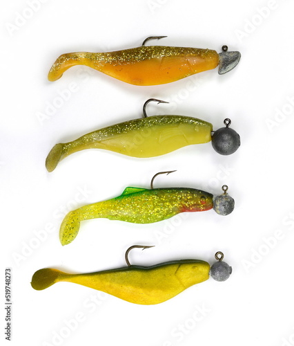 Many Silicon Fishing Twisters with Hook and Sinker Isolated on White Background