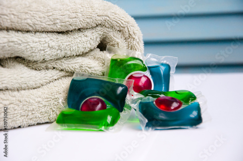 detergent pods at towel. minimalism of detergent. laundry detergent photo