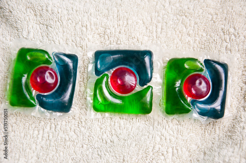 detergent pods on towel. minimalism of detergent. laundry detergent photo