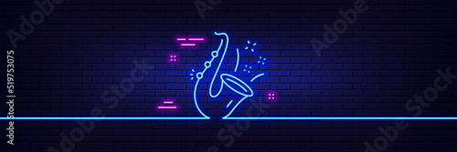 Neon light glow effect. Jazz line icon. Saxophone Musical instrument sign. Music symbol. 3d line neon glow icon. Brick wall banner. Jazz outline. Vector