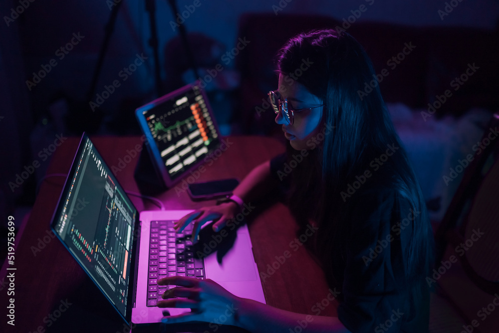 Attractive young woman working in home at night. Attractive young woman working in home at night.
