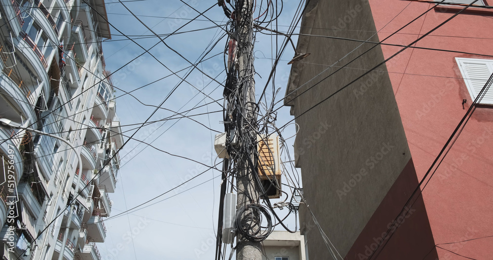 Tangled electricity fiber optic cables in communication systems ...