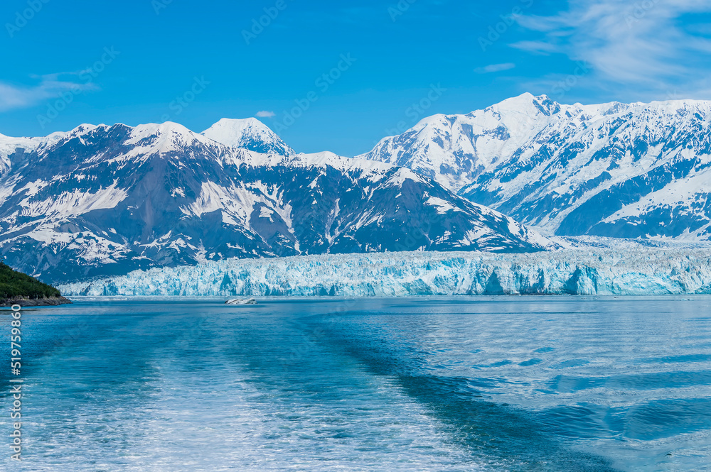 A view sailing away from the Hubbard Glacier in Alaska in summertime