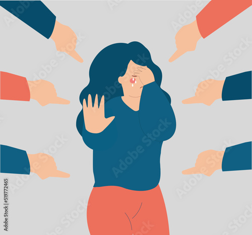 Depressed young woman victim of abuse and bullying. Teenage female teenage crying and surrounded by big fingers to blame her. Stop mental and physical violence concept. Mental health awareness.