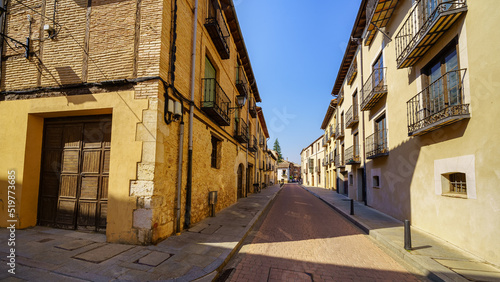 Narrow alleys with old stone buildings in the picturesque town of Burgo de Osma  Soria.