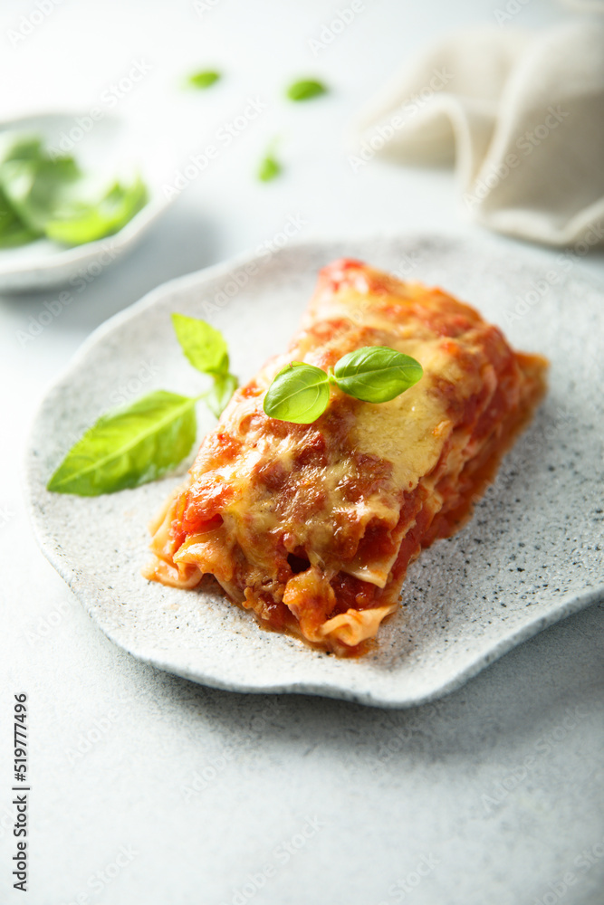 Traditional homemade lasagna with fresh basil Traditional homemade lasagna with fresh basil