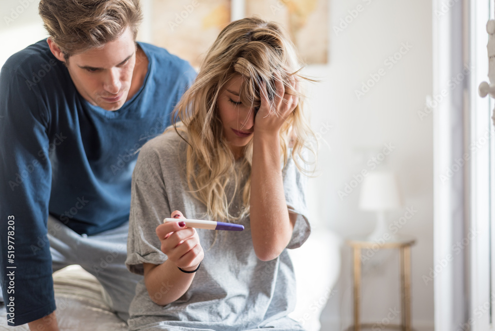 Young couple scared after pregnancy test result Young couple scared after pregnancy test result