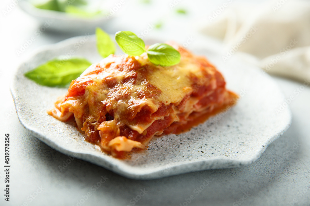 Traditional homemade lasagna with fresh basil Traditional homemade lasagna with fresh basil