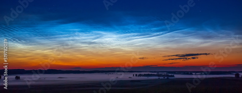 Night shining - Noctilucent clouds at night, panorama