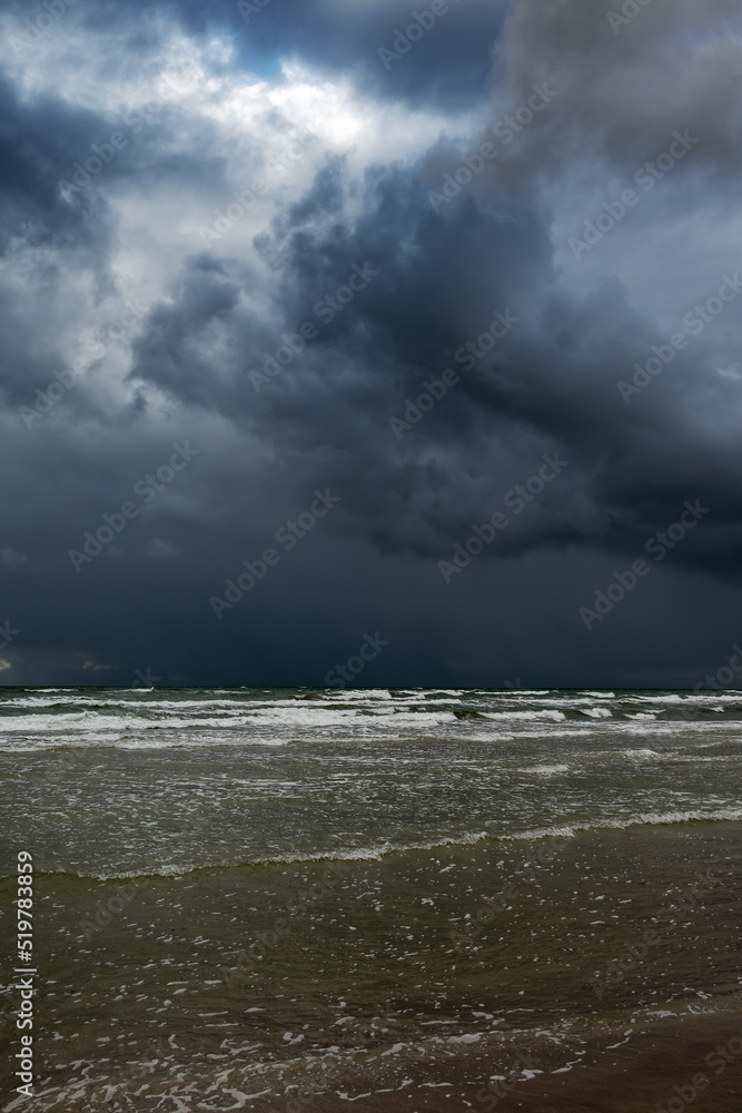 Dark sky over Baltic sea.