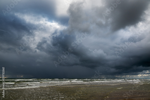 Dark sky over Baltic sea.
