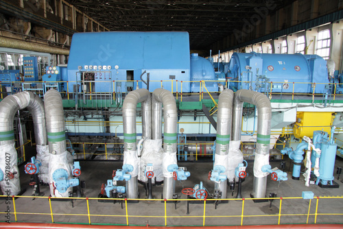 CHP. Huge production of heat generation for the population. Heat electro center. Large-scale enterprise with wires and turbines.