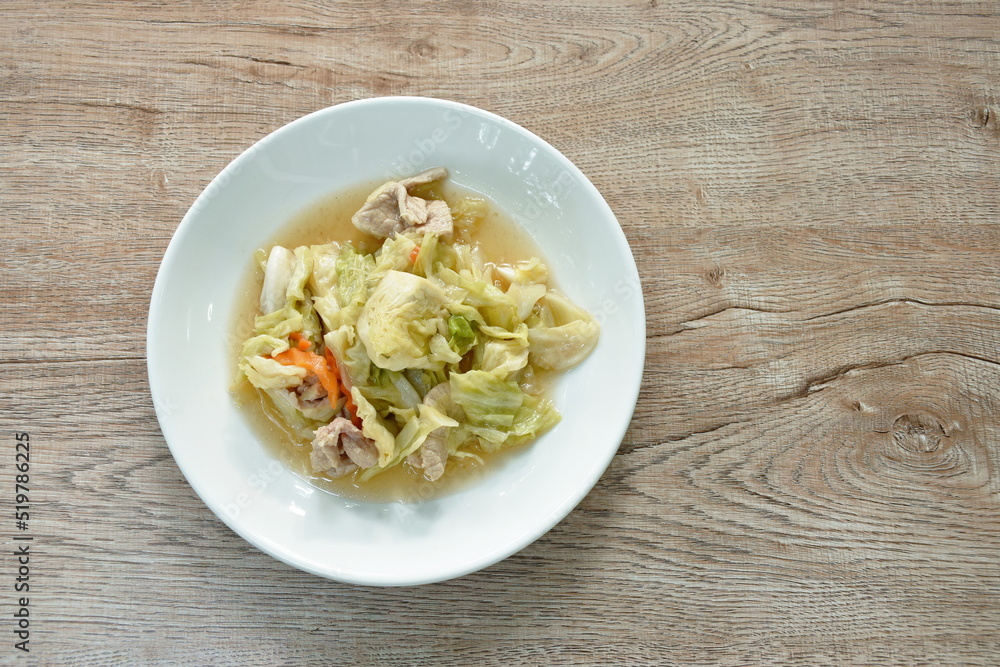 stir fried slice cabbage and pork with fish sauce on plate stir fried slice cabbage and pork with fish sauce on plate