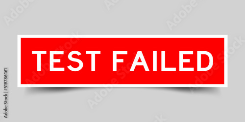 Red color square shape sticker label with word test failed on gray background