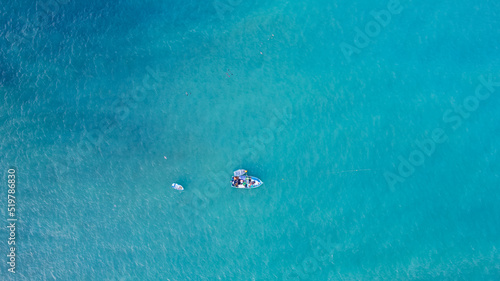 Fishing boat on the turquoise sea