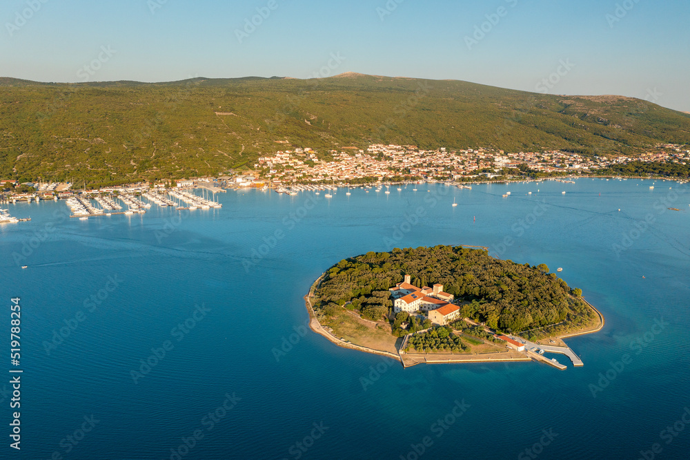 Aerial view of Kosljun monastery with Punat town in the background, Krk island, Croatia - obrazy, fototapety, plakaty 