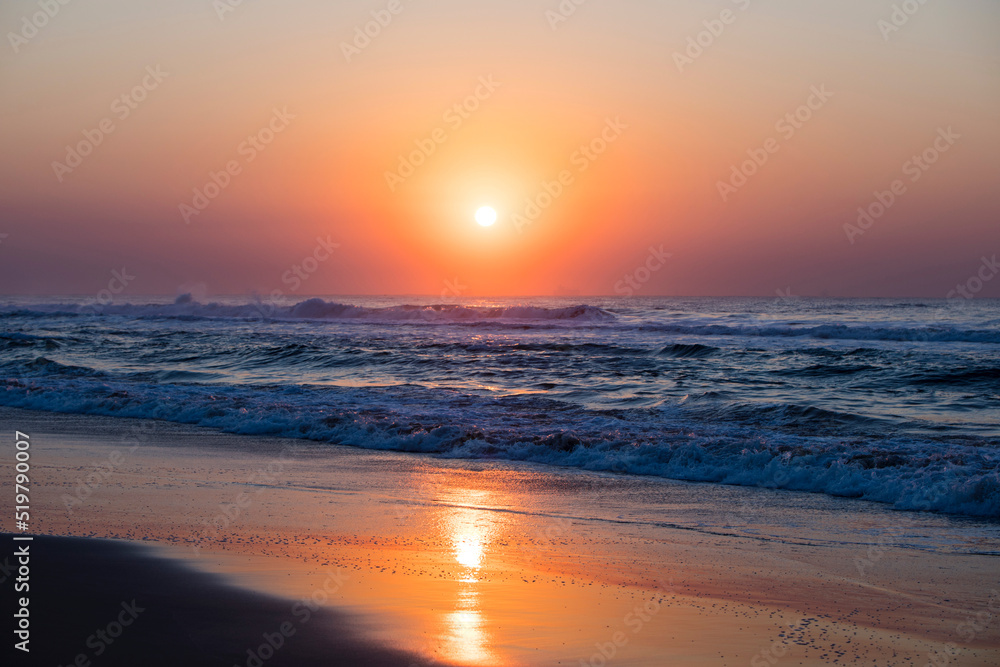 Orange sunrise over ocean
