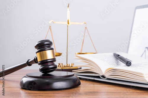 Judge's hammer and scale on the table, legal issues