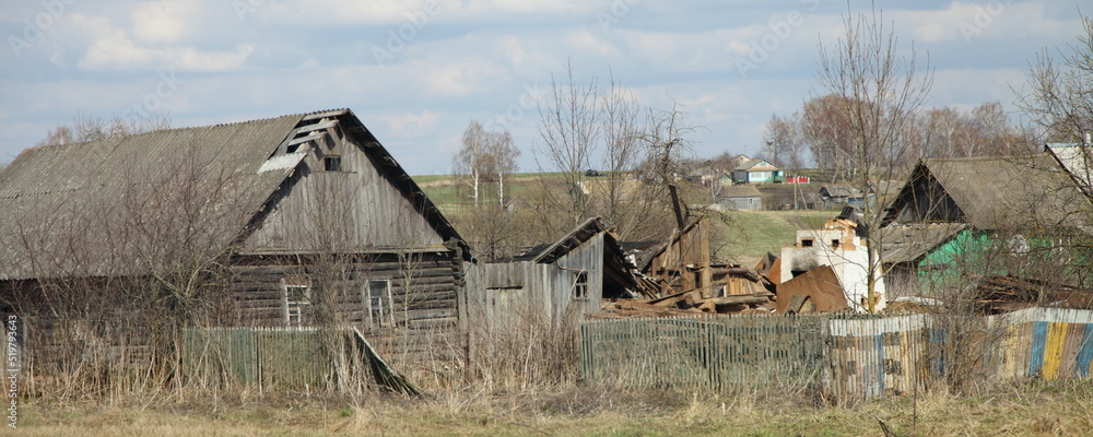 Abandoned Russian rural houses at spring day