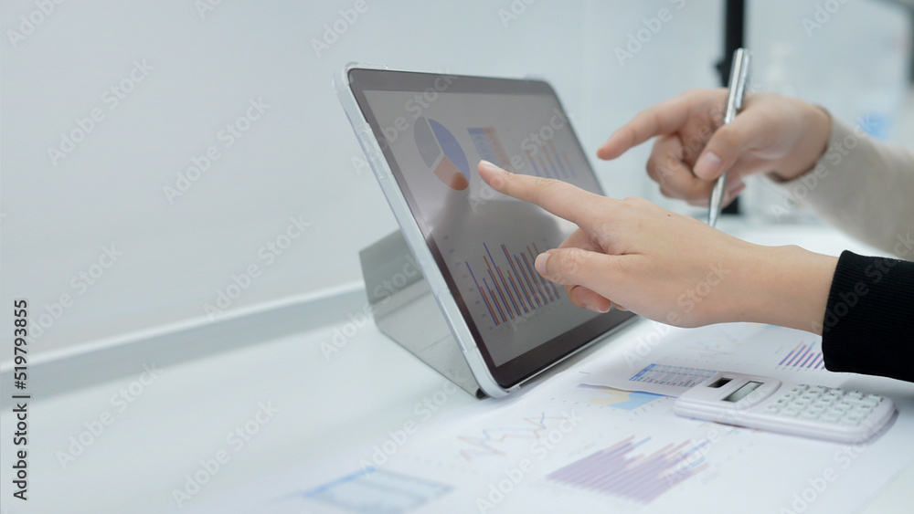 close up businesswoman hand point on dashboard screen tablet device for ask and consulting with businessman partner for kpi and investment concept close up businesswoman hand point on dashboard screen tablet device for ask and consulting with businessman partner for kpi and investment concept