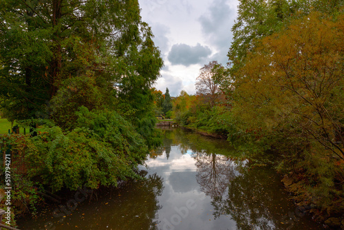 Fototapeta Naklejka Na Ścianę i Meble -  Pond in forest at autumn. Beautiful pond landscape photo in a park at fall