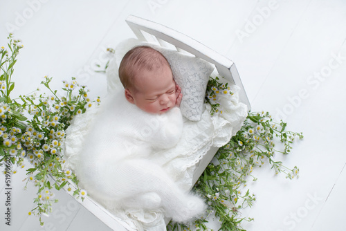Lovely newborn resting on pillow. sleeping newborn baby boy