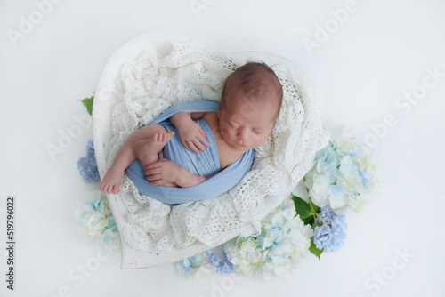 Lovely newborn resting on pillow. sleeping newborn baby boy