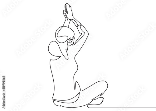 silhouette of a woman in yoga pose