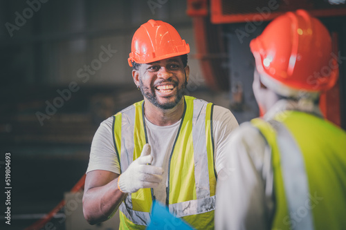 Teamwork African American worker in the factory, Black man afro work heavy industrial
