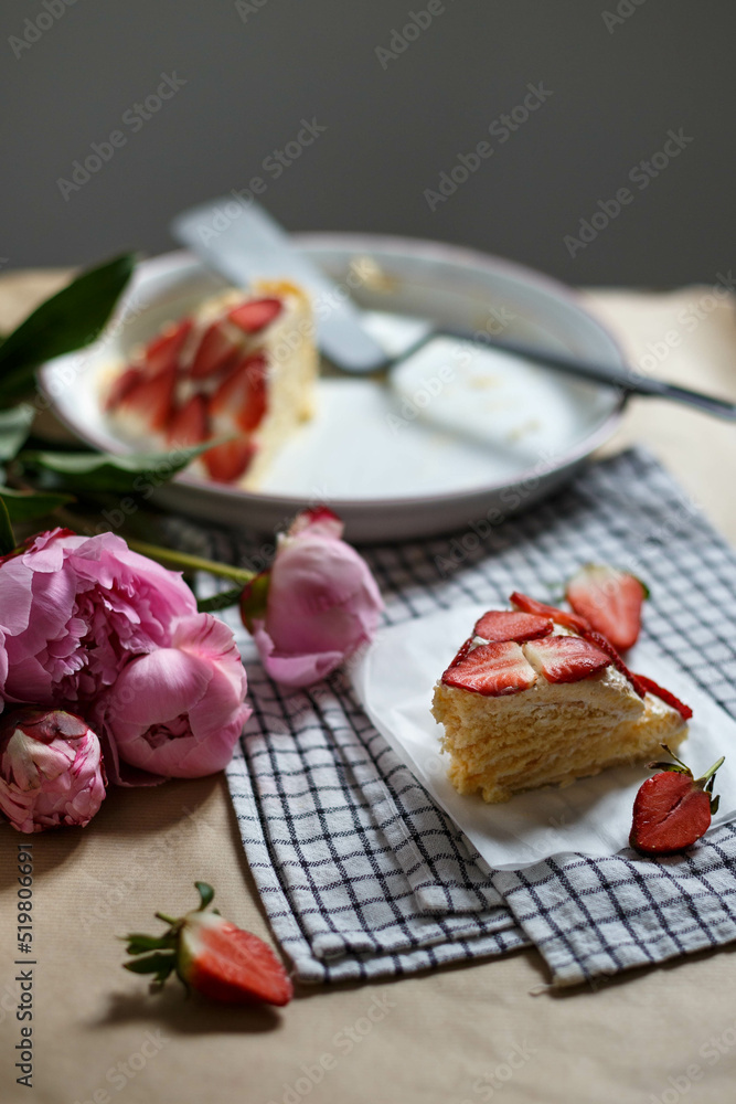 strawberry cake serving and piones