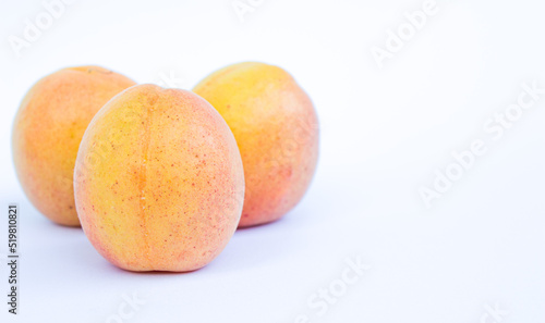 Apricot fruits isolated on white background.