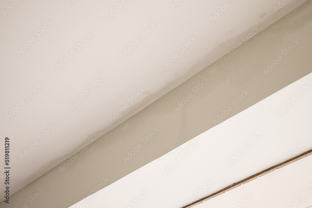 Rain water leak damaged ceiling close up Rain water leak damaged ceiling close up