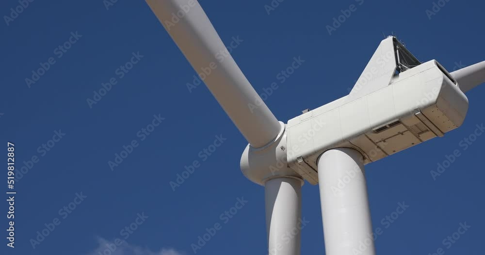 A wind turbine wind-powered electrical generators kinetic energy of wind into electrical energy network technology digital background connection A wind turbine wind-powered electrical generators kinetic energy of wind into electrical energy network technology digital background connection