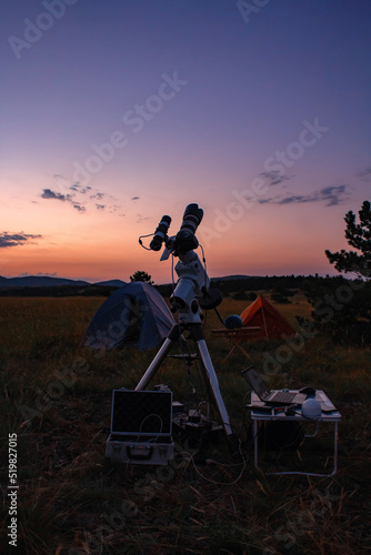 Картината върху платно Astronomical telescope and camera equipment for capturing, observing stars, Milky way and planets in nature, far from light pollution and urban zones