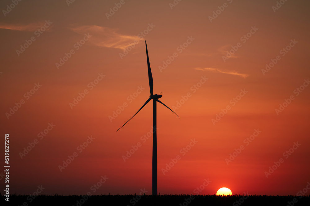 Windmill farm park in silhouettes with colorful sky. Windmill farm park in silhouettes with colorful sky.