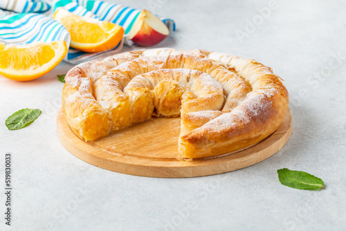 Traditional feta cheese phyllo pastry pie. photo