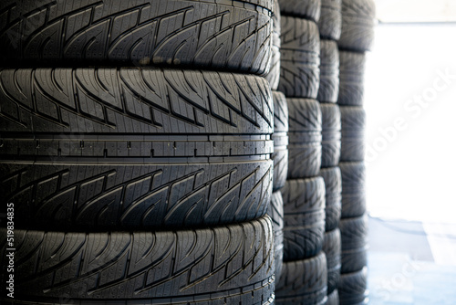 Motor sport wet rain racing car tire set close up